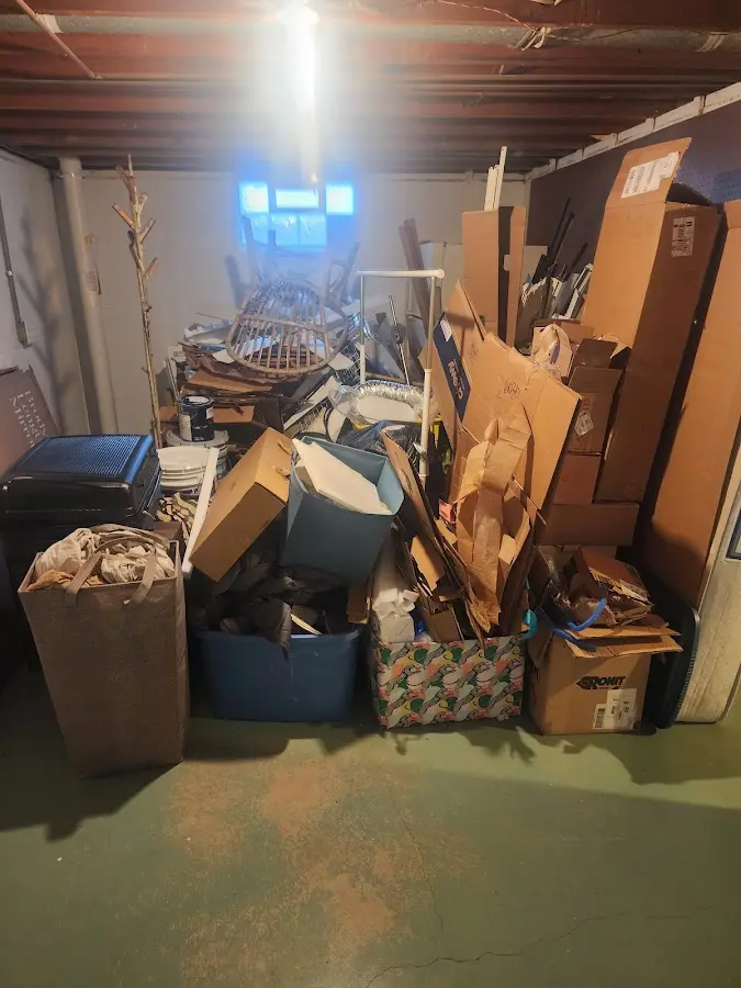 Roll-off dumpster container at job site for Construction Dumpster Rental in Walled Lake